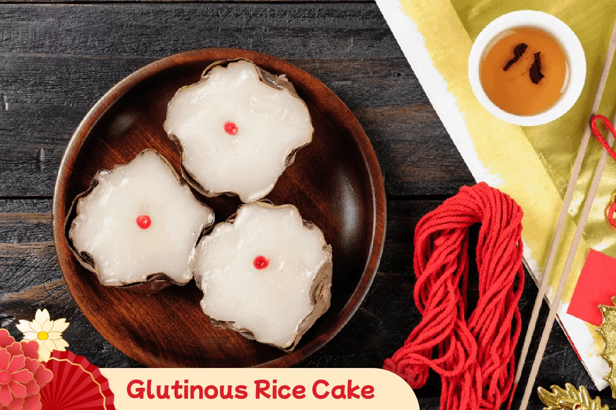 Enjoying traditional glutinous rice cake (Niánnián gāo) during Chinese New Year to symbolize continuous improvement, career advancement, and rising achievements for the year ahead